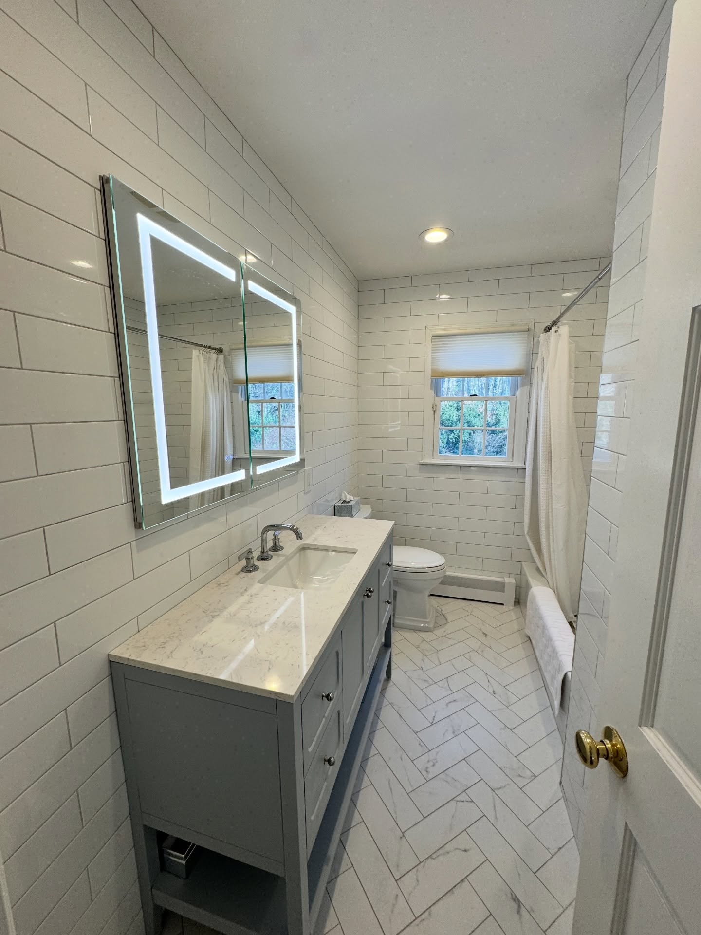 Herringbone tile bathroom
